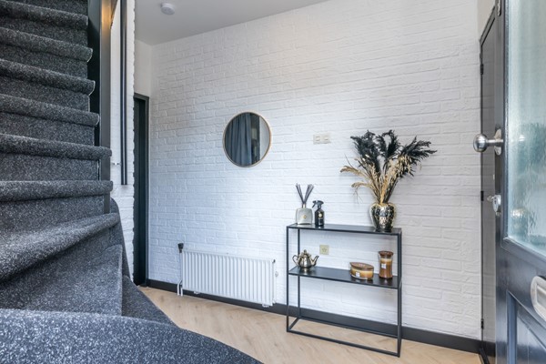 Foto - Verkocht onder voorbehoud: 2 kap geschakelde woning met garage en tuin in Brunssum